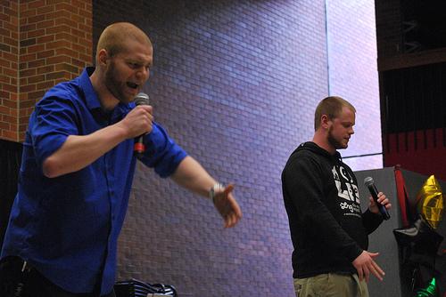 Photo by Laura Ueckert
Brothers Cam Fleming (left) and James Fleming (right) perform a rap together at Black Student Unions Show Case on May 18. 