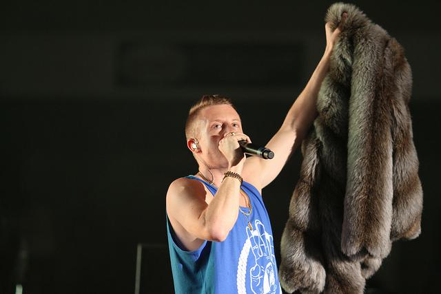 Macklemore performs on stage at Reese Court. Photo by Aaron Malmoe