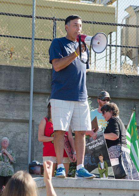 Congressional candidate Joe Pakootas, D-Washington, addresses the crowd at the Peoples Climate March in downtown Spokane.