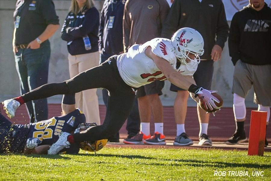 Cooper Kupp dives with the ball in hand during the game on Oct. 24