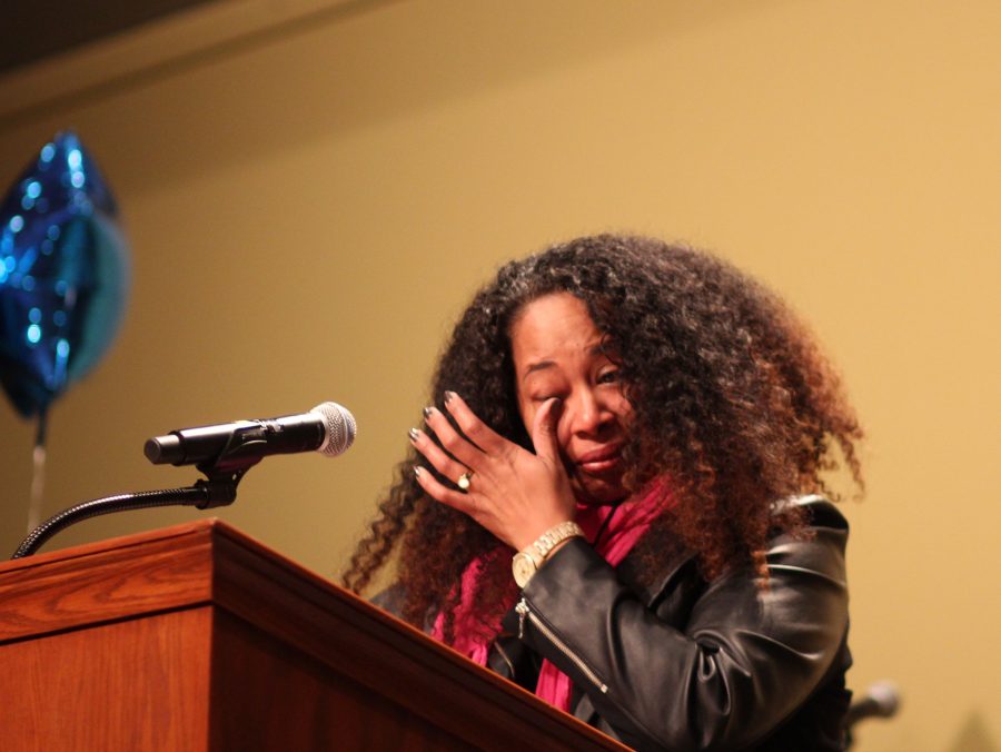 EWU Chief of Staff Angela Jones approaches the podium in tears before her speech at Spokane's Convention Center for the Women's March.