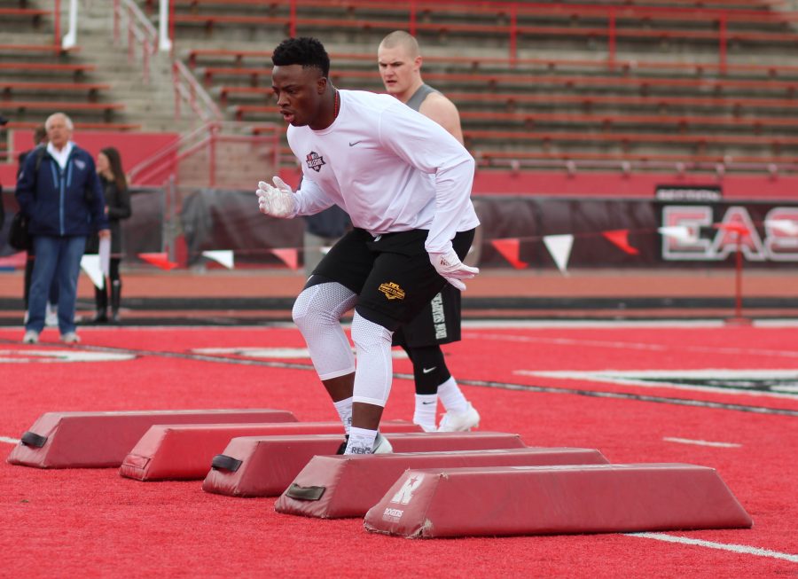 Defensive end Samson Ebukam performing bag drills. 