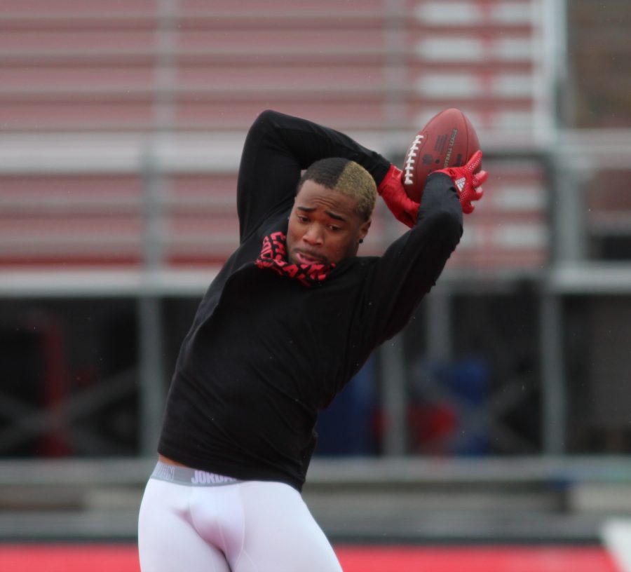 Wide receiver Shaq Hill making a catch during the wide receiver field workouts.
