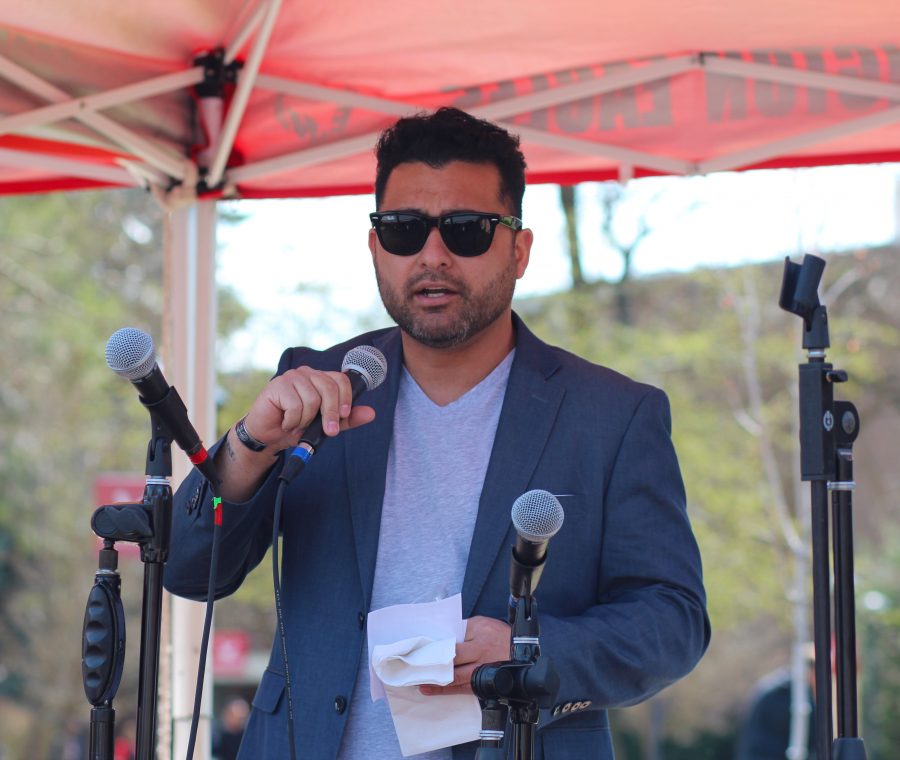 Jaime Olguin, ASEWU presidential candidate, addresses the audience at the Campus Mall.