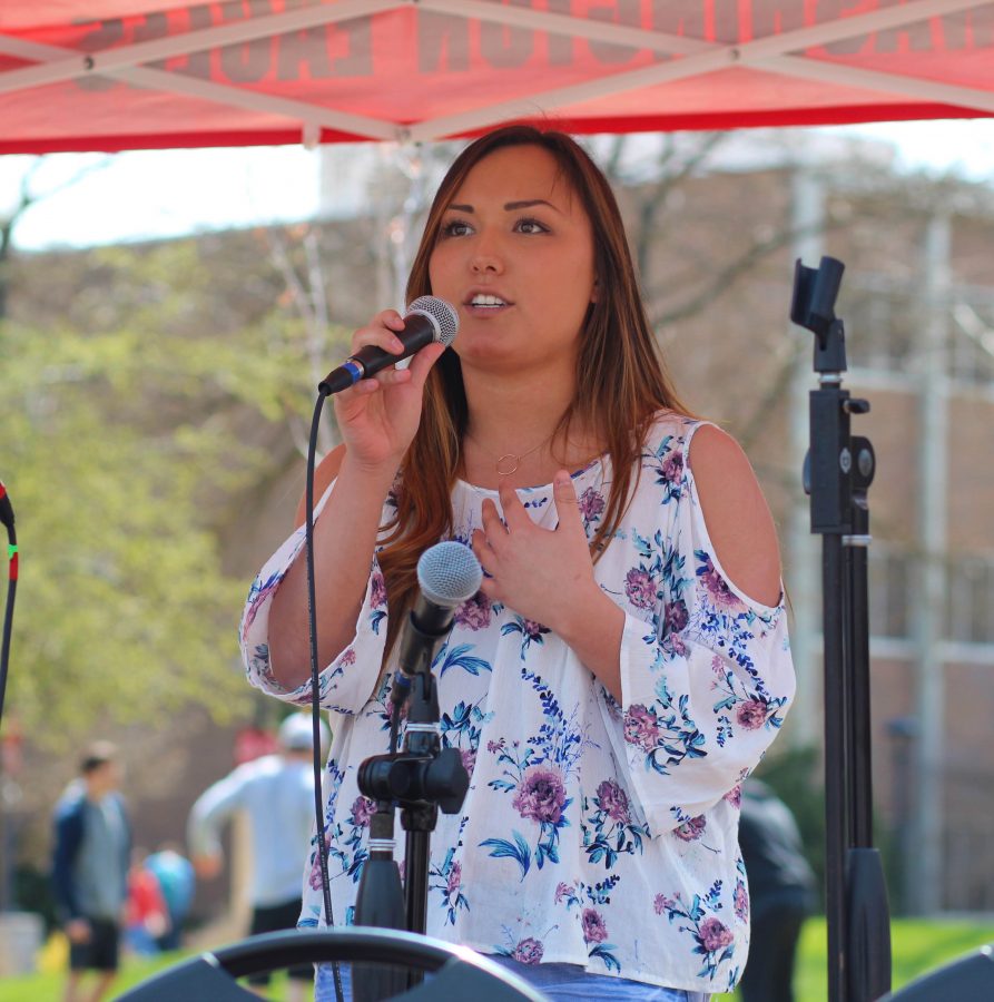Elizabeth Shimamoto, ASEWU executive vice president candidate, addresses the audience at the Campus Mall. 
