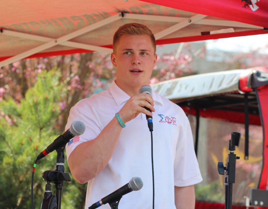 Jake Radawick, ASEWU athletic affairs and university advancement representative candidate, addresses the audience at the Campus Mall. 