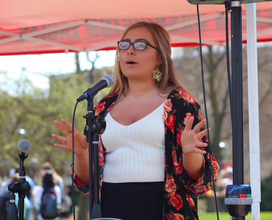 Haley Risley, ASEWU legislative affairs representative candidate, addresses the audience at the Campus Mall. 