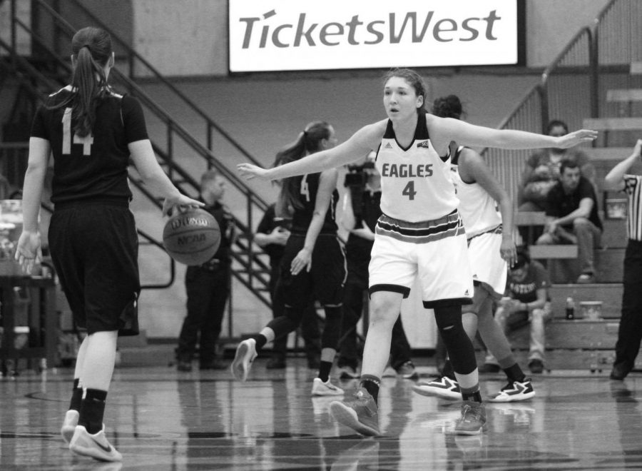 Senior forward Delaney Hodgins defends her opponent in a conference game last season. Hodgins was named the Big Sky Conference Preseason MVP | The Easterner Archives