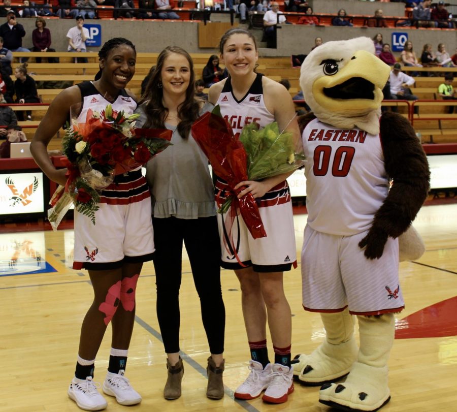 (left to right) Senior forward Mariah Cunningham, senior team manager Sarah Kroontje and senior forward Delaney Hodgins pose with Swoop before the EWU women beat Idaho State 66–64 on Feb. 24. The Eagles are in a four-way tie for third place in the Big Sky with two conference games remaining | Mckenzie Ford for The Easterner