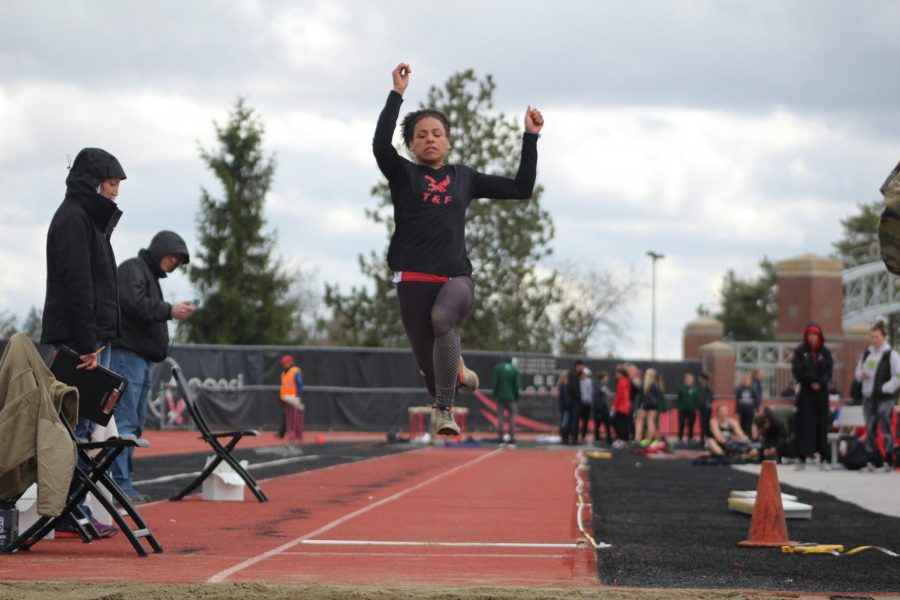 Freshman+Alexis+Rolan+triple+jumps+during+the+46th+Annual+Pelluer+Invitational+on+April+14.+Rolan+took+first+in+three+individual+events+at+the+meet%3A+the+100-meters%2C+200-meters+and+long+jump.+%7C+Mckenzie+Ford+for+The+Easterner