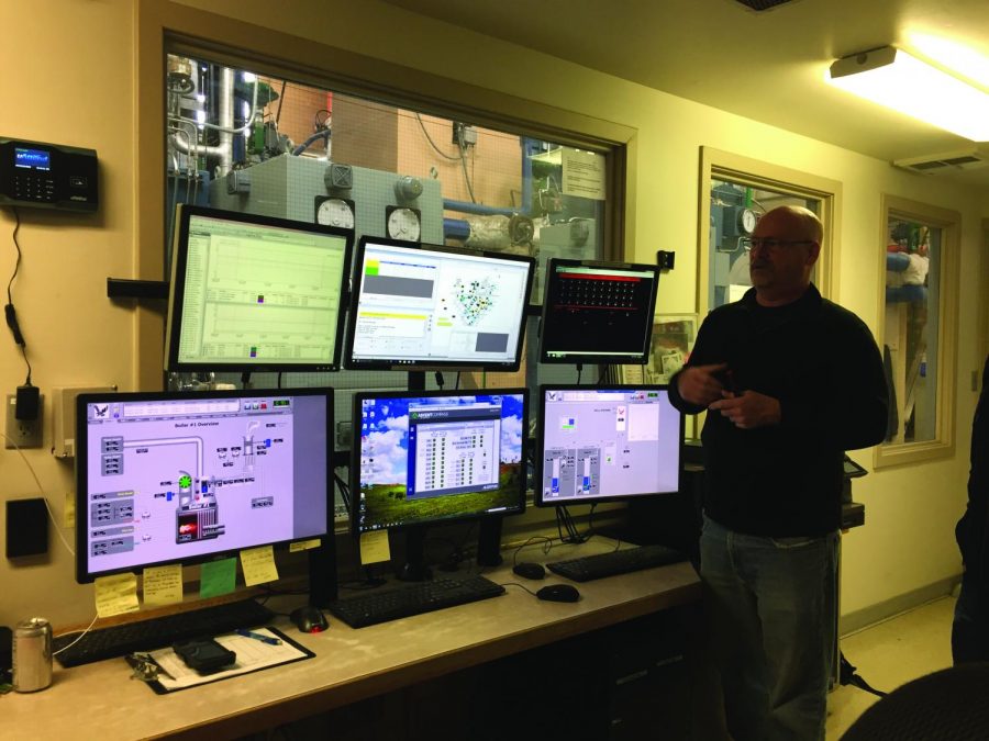 Mark Lindsay, the Energy Management Supervisor at the Rozell Plant, led the tunnel tour last Monday. The computer control room as seen here is used to locate specific problems in every area of the entire system, including the campus buildings | Kaitlyn Engen for The Easterner
