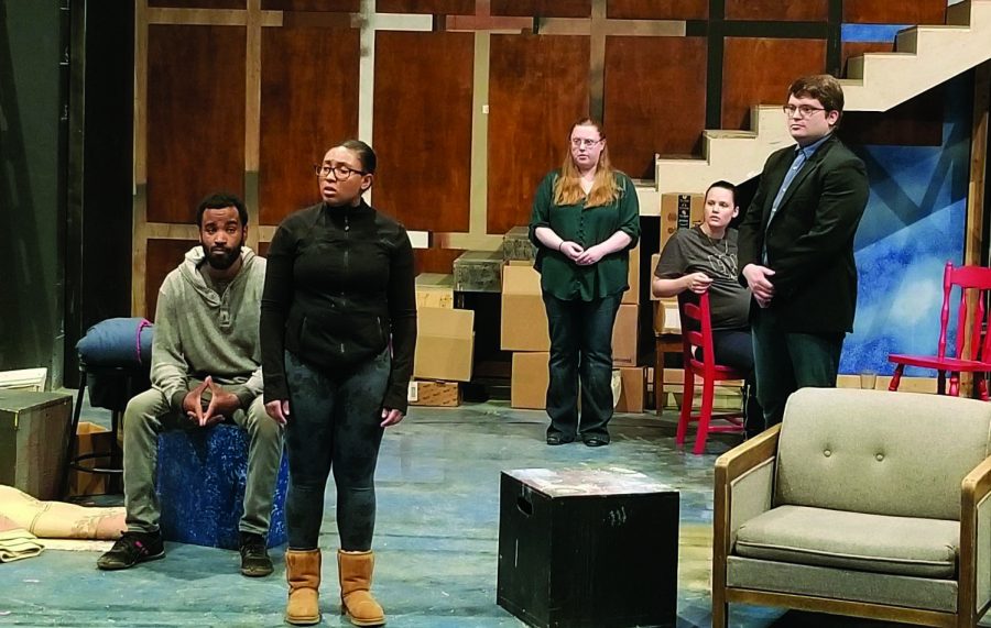 Actors rehearse on stage in the EWU Theatre Building on April 23. Tension rose in the room during this scene in the first act f Bruce Norris play, Clybourne Park, a sequel toLorraine Hansberys play, A Raisin in the Sun 