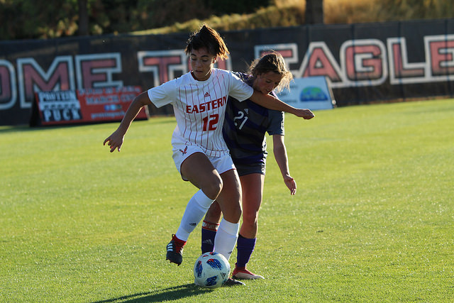 EWU junior Saige Lyons fights for the ball against Weber State on Oct. 3. The Eagles lost 1-0.