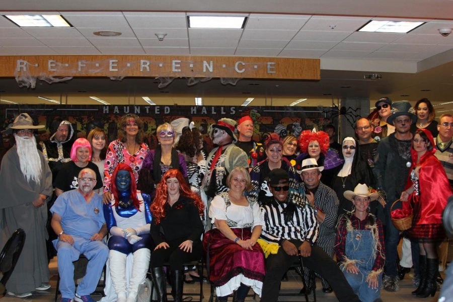 Attendees pose during the 2016 edition of Oktoberfest. The 2018 version will be at JFK Library on Oct. 20 and will be fairytale themed.
