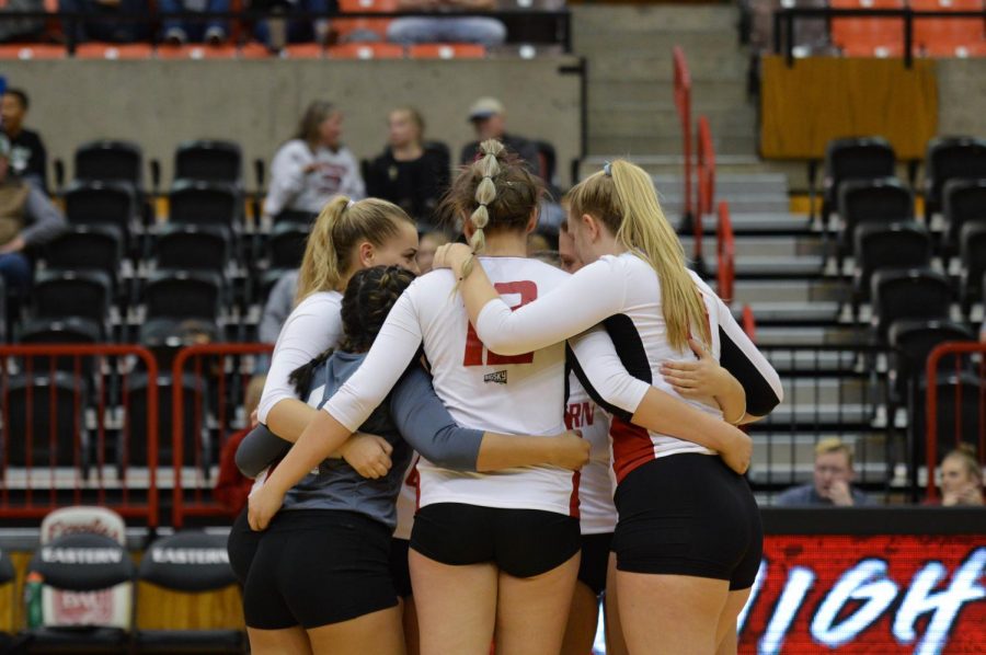 The Eagles huddle up after a point. EWU lost three straight sets after winning the first to lose to Northern Colorado on Oct. 20. 