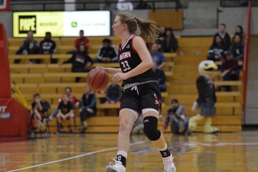 Freshman+guard+Grace+Kirscher+handles+the+ball+against+Gonzaga+on+Nov.+11.+Since+the+Gonzaga+game+Kirschers+role+has+steadily+increased+and+she+is+now+second+on+the+team+in+scoring+with+9.9+points+per+game.