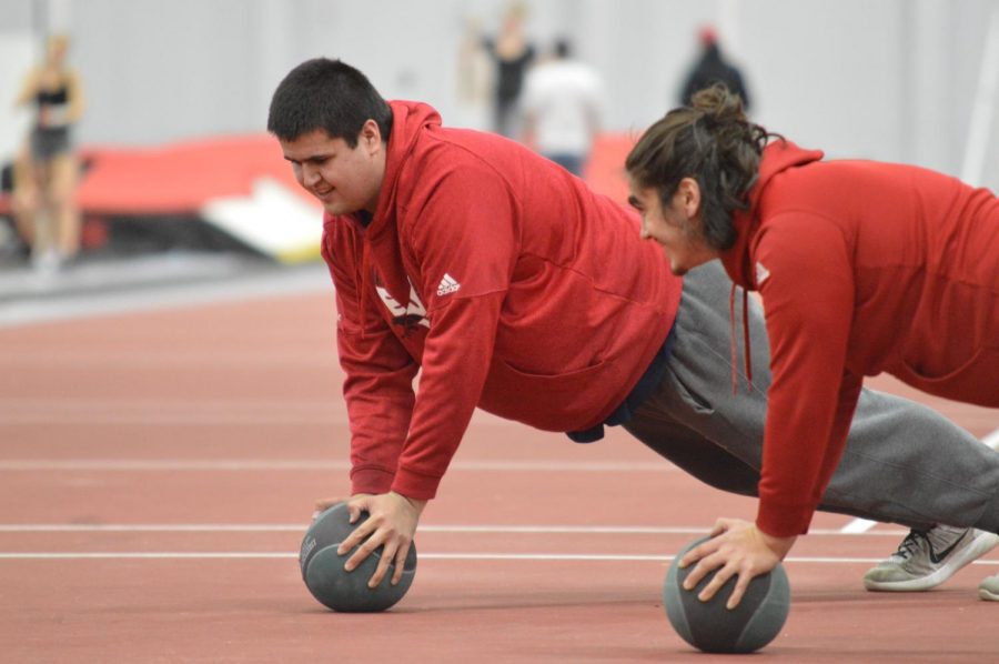 Left to right: Throwers freshman Garrett Peoples and junior Jonny Law work their cores in training on Jan. 17. Peoples has the top mark in the shot put for EWU this year with a 16.01 meter throw in the Lauren McCluskey Memorial Open on Jan. 12.