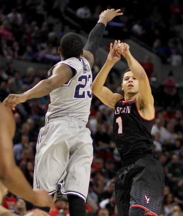 Former EWU guard Tyler Harvey shoots over a Georgetown University defender in the first round of the 2015 NCAA Tournament. In EWUs second-ever appearance in the NCAA Tournament they lost 84-74 to the No. 4 seed Hoyas. 