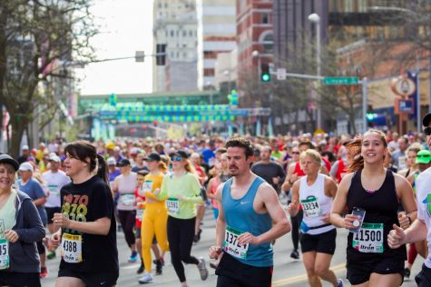 Thousands make their way through downtown Spokane on Sunday as a part of the 43rd annual Bloomsday.