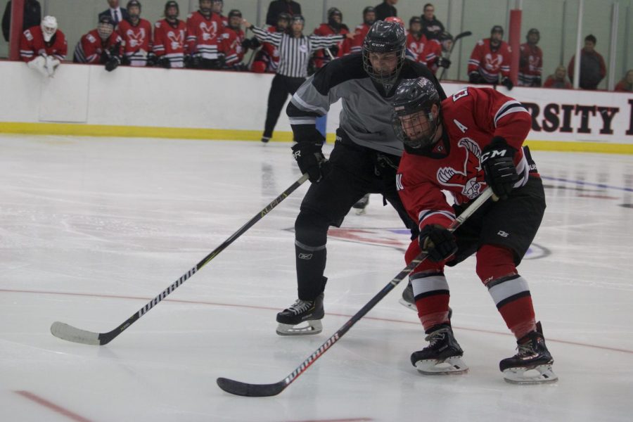 EWU sophomore forward Mitch Hunt attacks the puck during EWUs 12-0 rout over Gonzaga Friday night. 