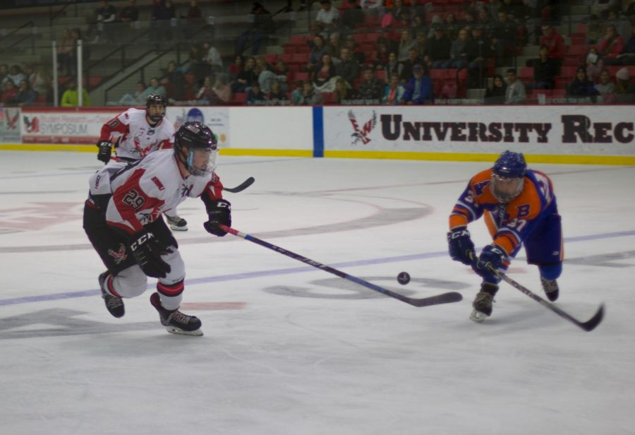 EWU sophomore forward Mitch Hunt (left, #29) pursues the puck. The Eagles swept Boise State in a two-game weekend series. 