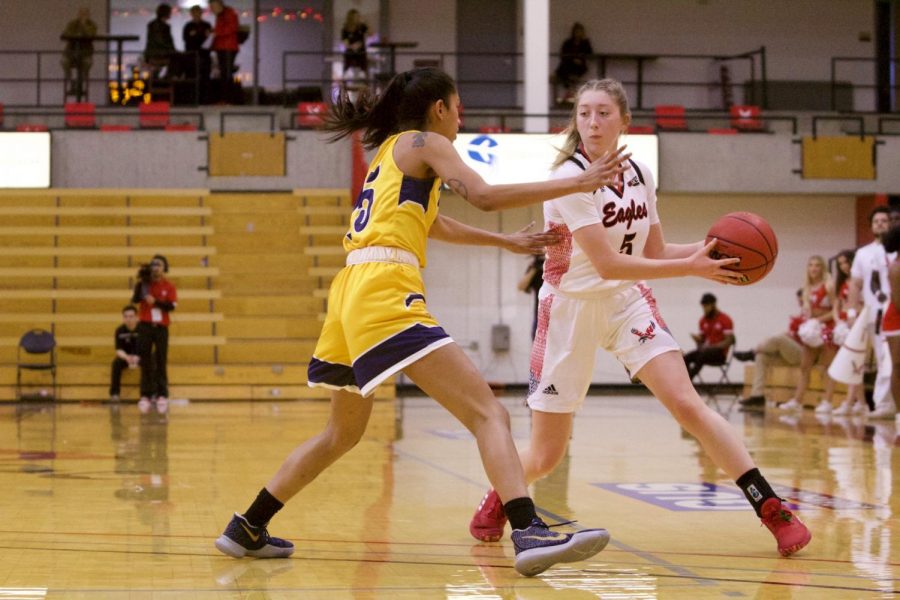 EWU freshman guard Jenna Dick looks to pass to the post. Dick got the start at point guard Sunday and responded by scoring a career-high 17 points.