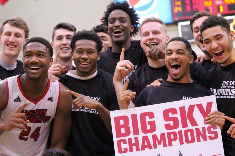 The EWU mens basketball team celebrates its Big Sky regular season title. EWU clinched the title with a 78-69 victory over Weber State Saturday.