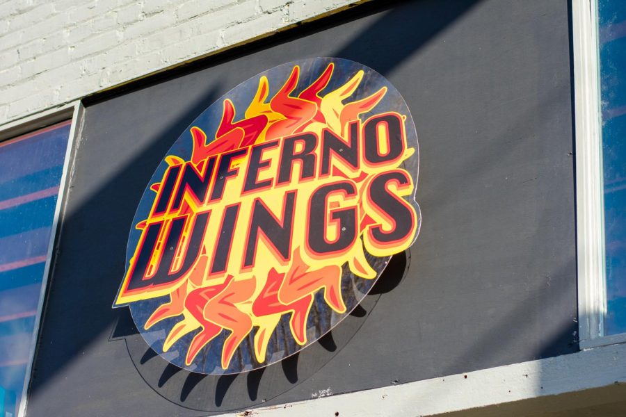 The+Inferno+Wings+logo+resembles+a+sun+made+of+chicken+wings.