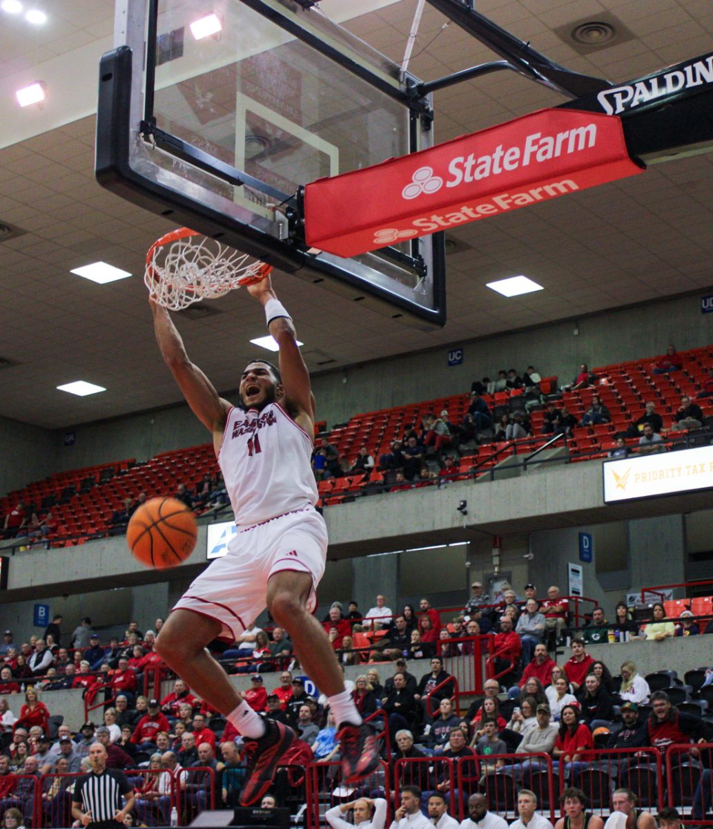 #11 Nic McClain throws down a dunk for two of his 28 points against Cal Poly on Nov. 17.