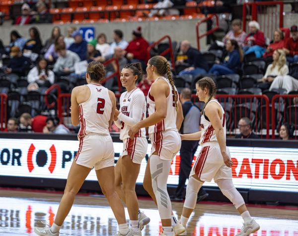 EWU women’s basketball players walk onto the court after a timeout during a game against Northwest University on Nov. 2. From left to right: senior guard Ella Gallatin, sophomore guard Caitie Gingras, sophomore forward Kourtney Grossman and freshman guard Elyn Bowers.