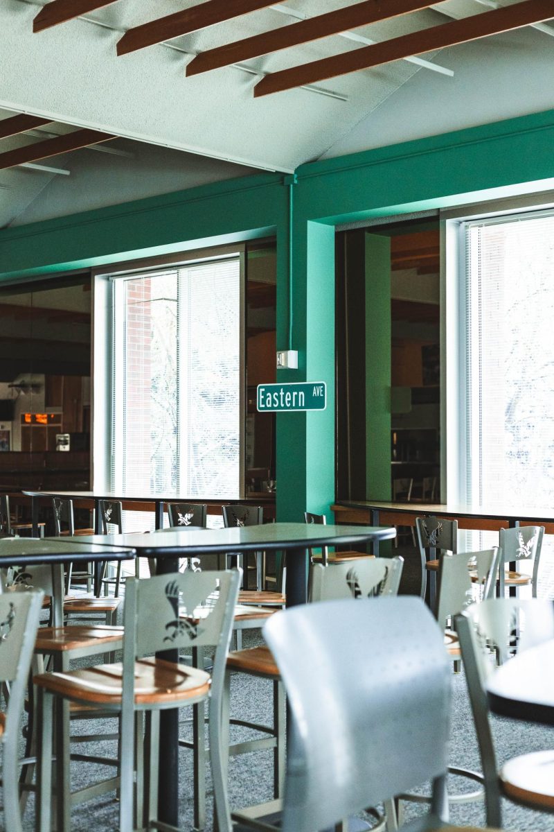 The former Tawanka Dining Hall, which was once a central hub for daily meals and gatherings,
has been retired and is no longer in operation. Previously serving hundreds of students per day, it
now remains a space. The old Tawanka kitchen is now storage, while the dining room itself
hasn’t changed a bit. The classic road signage and neon lighting signs remain as bright as before.
Name tags from old kitchen workers are still posted on the kitchen doors. This retired dining hall
holds memories in each corner, a reminder of all the countless moments past students shared here
and the stories that continue long after the hall doors have shut.